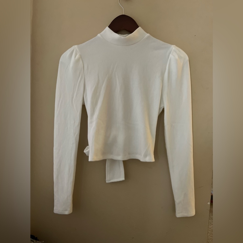 Francesca’s long sleeve top with open back!